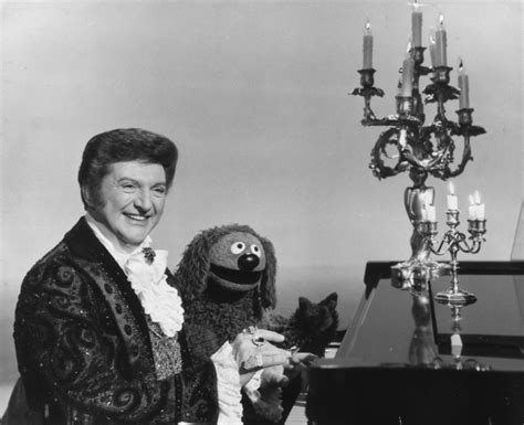 did liberace die of aids.